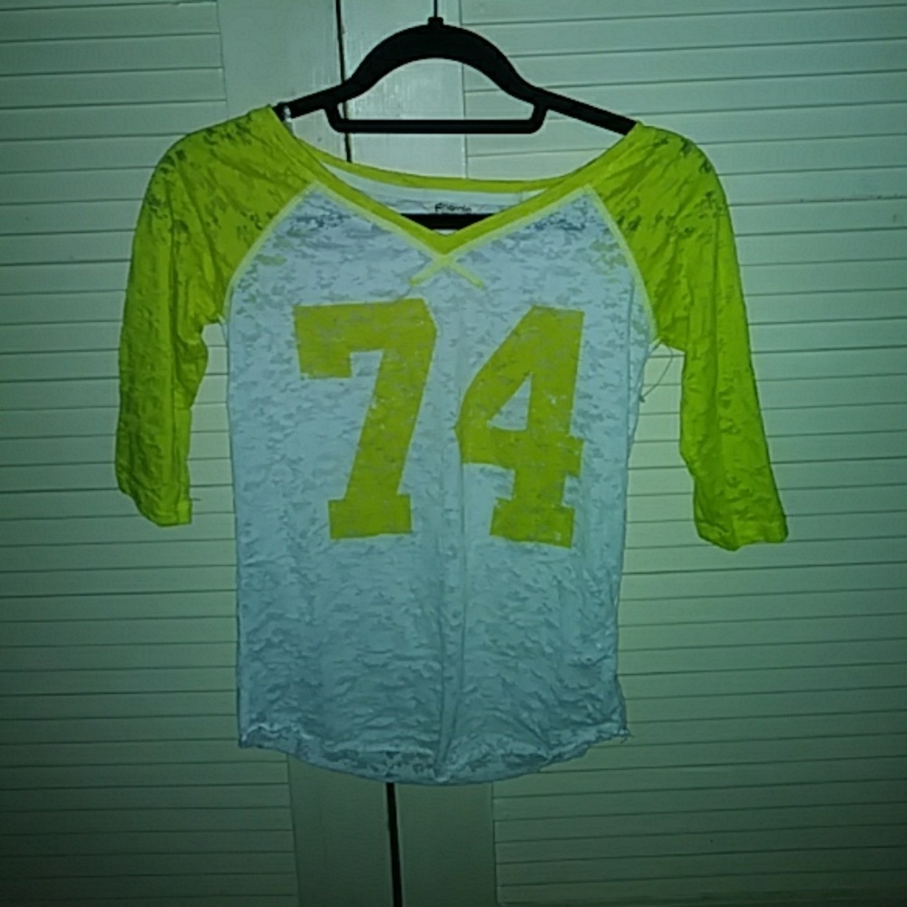 White and yellow #74 shirt